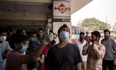 Delta plus should be treated as variant of concern: Former ICMR scientist A health worker takes a swab at a Covid-19 testing site in Uttar Pradesh, on May 4.(Photo: Bloomberg)
