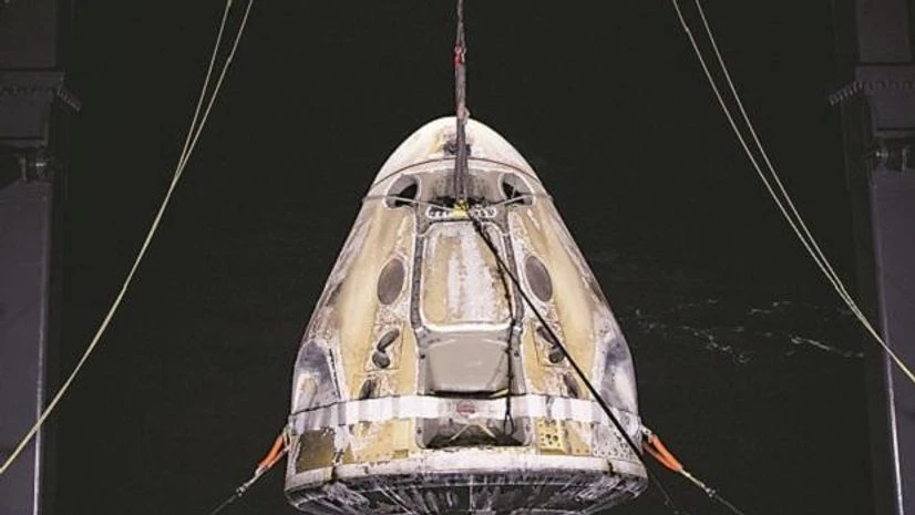 The SpaceX Dragon spacecraft is lifted on to the GO Navigator recovery ship after it landed in the Gulf of Mexico last week. Photo: Reuters The SpaceX Dragon spacecraft is lifted on to the GO Navigator recovery ship after it landed in the Gulf of Mexico last week. Photo: Reuters