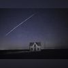 satellite, SpaceX StarLink satellites In this photo taken May 6, 2021, with a long exposure, a string of SpaceX StarLink satellites passes over an old stone house near Florence, Kan. The train of lights was actually a series of relatively low-flying satellites launched by Elon Musk's Spa