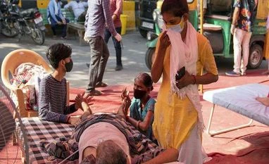 Companies offer employees time 'to heal' as Covid-19 cases surge in India corornavirus