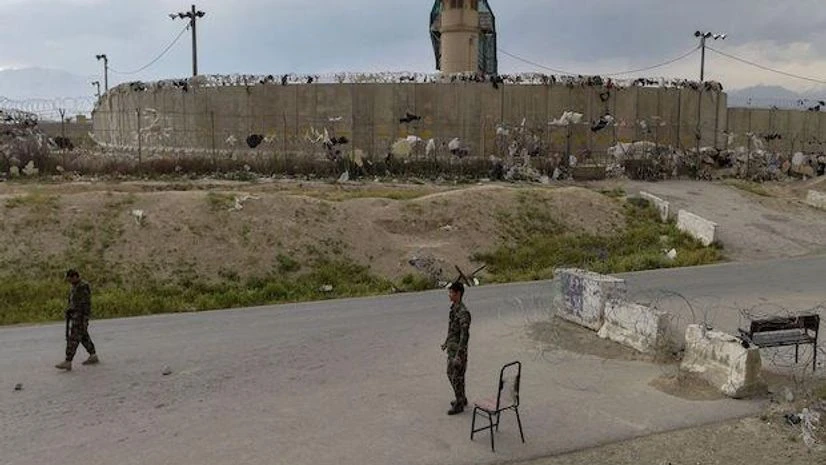 afghan White House national security aides have held several meetings and discussing options including a mass evacuation of thousands of people to a third country where they could be processed and brought to the U.S.