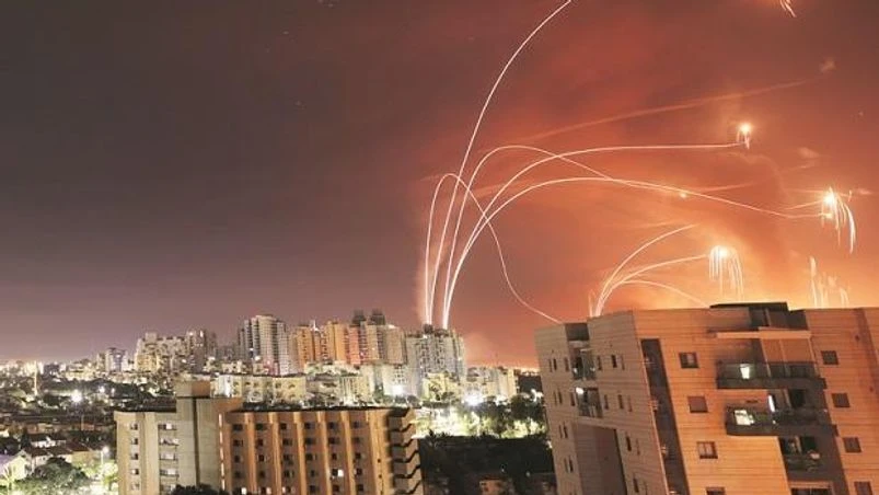 Streaks of light are seen as Israel's Iron Dome anti-missile system intercepts rockets launched from the Gaza Strip towards Israel, as seen from Ashkelon, Israel. Photo:?Reuters Streaks of light are seen as Israel's Iron Dome anti-missile system intercepts rockets launched from the Gaza Strip towards Israel, as seen from Ashkelon, Israel. Photo:?Reuters