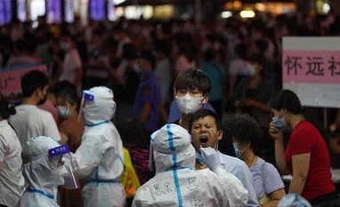 China's Guangzhou locks down neighbourhood after coronavirus upsurge Guangzhou