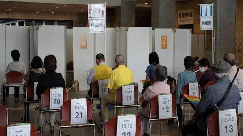 Japan vaccination Olympic games face shortage of medical staff as Covid cases surge in Japan