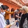 Medics screen tourists in view of the novel coronavirus (COVID-19) outbreak, at Junagarh fort in Bikaner (Photo: PTI)