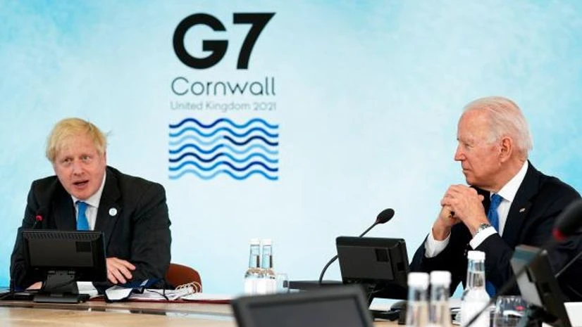 g7 British Prime Minister Boris Johnson, left, speaks as President Joe Biden listens during the G7 summit at the Carbis Bay Hotel in Carbis Bay, St. Ives, Cornwall, England (Photo: AP/PTI)