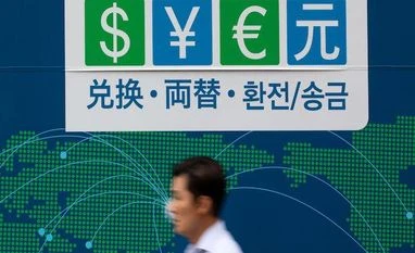 Dollar holds losses to euro after ECB comments, economic data currency exchange