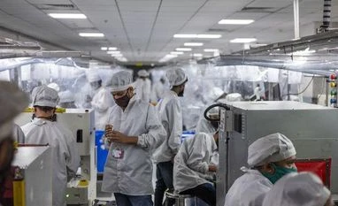 Indian economy showed signs of cooling in May before gaining momentum workers