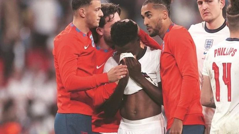 Bukayo Saka Bukayo Saka reacts after failing to score a penalty during a shootout.