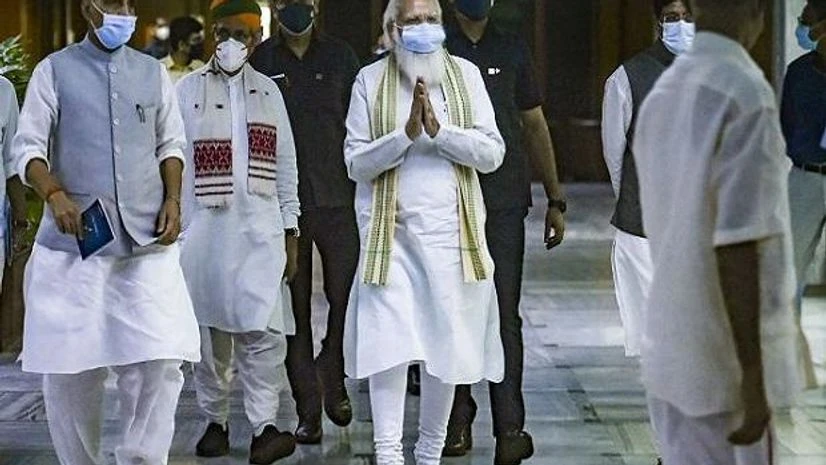 PM Modi, Narendra Modi Prime Minister Narendra Modi with Defence Minister Rajnath Singh during an all-party meeting, a day before the monsoon session of Parliament begins, in New Delhi. (PTI Photo)