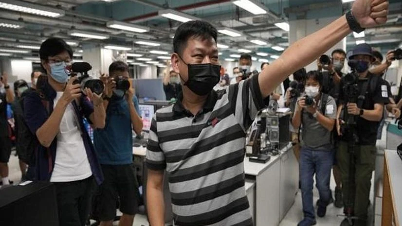 Apple Daily, Journalist arrest Hong Kong national security police on Wednesday, July 21, 2021, arrested Lam, weeks after the paper was forced to close after authorities froze its assets. (AP Photo)