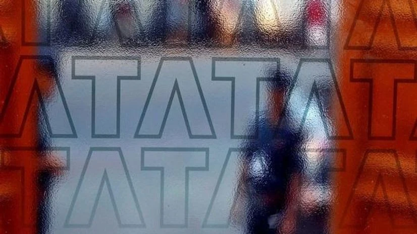 Tata Group A private security guard stands at the exit gate of the headquarters of Tata Consultancy Services (TCS) in Mumbai, India, Oct. 13, 2016. (Photo: Reuters)