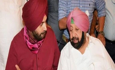 Amarinder, Sidhu agree on 10-member policy group for better coordination Navjot Singh Sidhu, Amarinder Singh