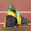 Olympic champ Herah to miss chance at 3rd straight title in 100, 200 meters Elaine Thompson-Herah