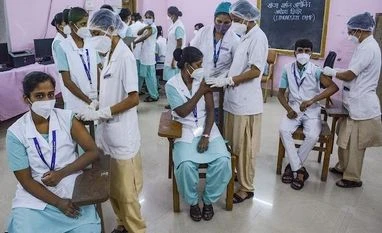 Maharashtra: 120 fresh Covid-19 cases in Thane, two more deaths Nurses at a training college in Thane are vaccinated for Covid-19 on Friday, July 30, 2021. (PTI Photo)