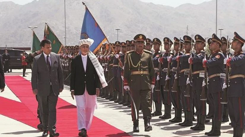Afghanistan, Afghan President Ashraf Ghani Afghan President Ashraf Ghani inspects the guard of honour during the extraordinary meeting of Parliament (Photo: AP/PTI)