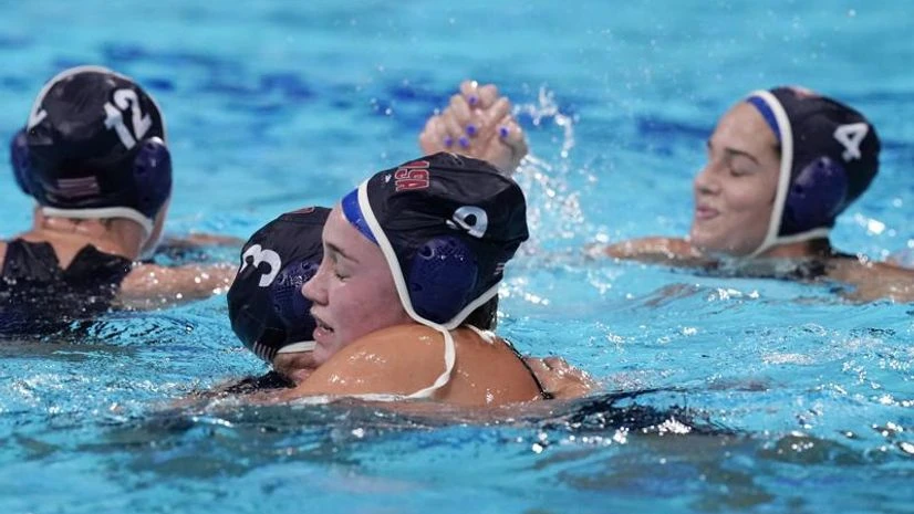 Water Polo, Tokyo Olympics United States' Melissa Seidemann (3) and Aria Fischer (9) celebrate after a win against the Russian Olympic Committee in a semifinal round women's water polo match at the 2020 Summer Olympics, Thursday, Aug. 5, 2021, in Tokyo, Japan. (AP Photo)