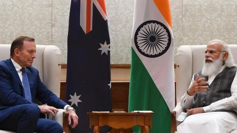 Modi Abbott Modi meets ex-Aus PM Abbott; leaders vow to strengthen economic cooperation