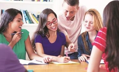 Grades will matter: UK study finds men with good grades better off education