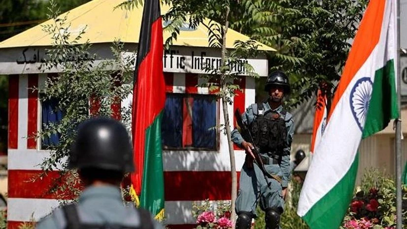 India Afghanistan trade Afghan policemen stand guard next to Indian and Afghan national flags, at a check point in Kabul city. (Photo: Reuters)
