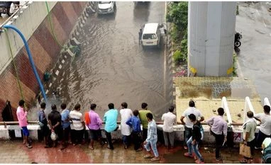 Heavy rains cause massive waterlogging in Delhi, cripple traffic delhi rains