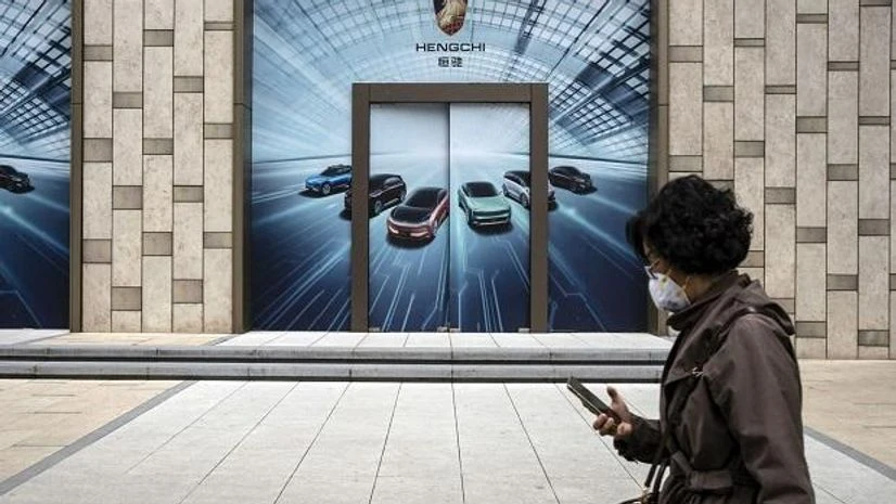 Evergrande Evergrande said earlier this month it was in talks with “several independent third-party investors” to sell stakes in the electric vehicle and property services subsidiaries. (Photo: Bloomberg)