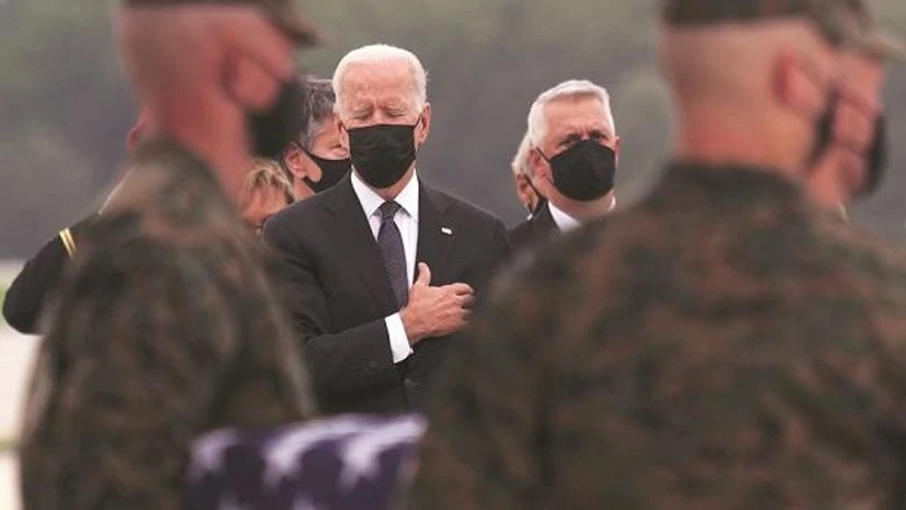 Joe Biden, Afghanistan crisis US President Joe Biden at the grim homecoming for 13 US troops killed in a suicide bombing near Kabul airport. (Photo: Reuters)