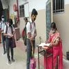 Students being allowed in after following the SOPs at SRM Nightingale Matriculation Higher Secondary School in Mambalam, Chennai.