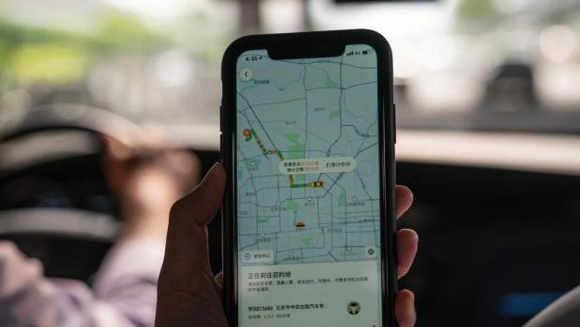 Didi's shares spiked 8% before paring gains to about 5% higher in pre-market trading in New York. Photo: Bloomberg