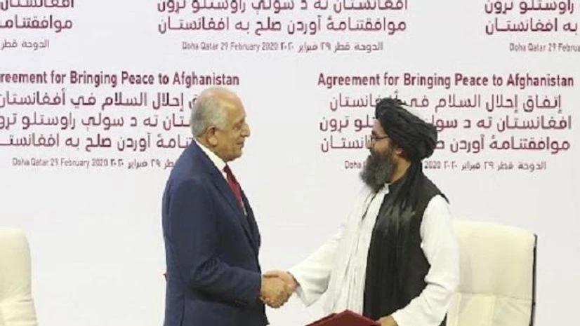 File photo: US peace envoy Zalmay Khalilzad, left, and Mullah Abdul Ghani Baradar, the Taliban group's top political leader shake hands after signing a peace agreement between Taliban and U.S. officials in Doha, Qatar. File photo: US peace envoy Zalmay Khalilzad, left, and Mullah Abdul Ghani Baradar, the Taliban group's top political leader shake hands after signing a peace agreement between Taliban and U.S. officials in Doha, Qatar.