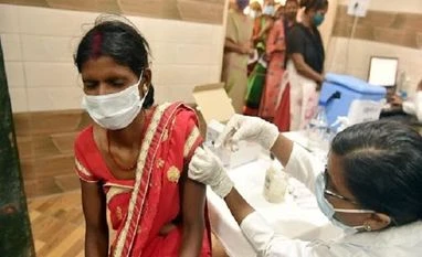 Over 825.7 mn coronavirus vaccine doses given to states, UTs so far: Govt A medic gives a Covid-19 vaccine dose to a woman at the state-run Civil Hospital in Lucknow, on September 9, 2021. (PTI Photo/ Nand Kumar)