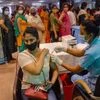 A health worker administers a dose of Covid-19 vaccine to a visitor at a district government hospital in Noida on September 13, 2021. (PTI Photo)
