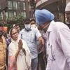 West Bengal CM Mamata Banerjee (centre) visits Gurdwara Sant Kutiya during her campaign