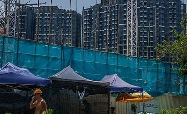 Liquidity worries deepen as unit of Chinese developer Kaisa misses payment China, real estate, economy, Evergrande