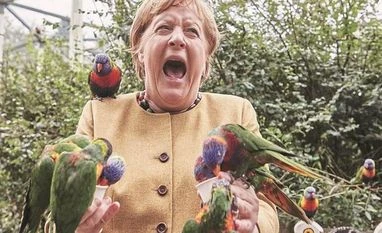 German millionaires rush assets to Switzerland fearing a Left turn Angela Merkel