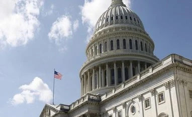 Dollar weakens, stocks rise as consumer prices jump in Nov, data shows us stocks