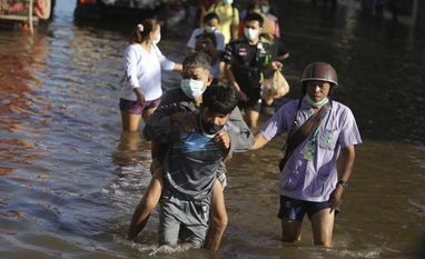 Flooding threat hangs over Thai capital Bangkok lashed by monsoon rains Bangkok Floods, Thailand