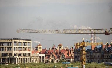 Evergrande pays back some cash owed to wealth product investors Evergrande