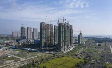 Evergrande Group's trading halted in Hong Kong as debt test looms Evergrande