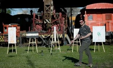 Artist who squirts paint with eyes destroys canvases to create NFTs Argentine artist Leandro Granato