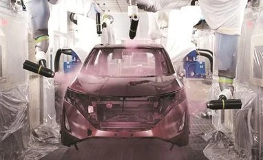 Smart robots do all the work at Nissan's 'intelligent' plant: Report Nissan motor, Nissan plant