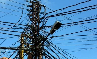 Electricity to become costlier in Pak as govt hikes tariff by Rs 1.39/unit Electricity cables