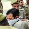 Ashish Mishra arrives at the police’s Crime Branch office in Lakhimpur Kheri on October 9, 2021. Mishra is under arrest for the violence in Lakhimpur during farmer protests on October 3. (PTI photo/ video grab)