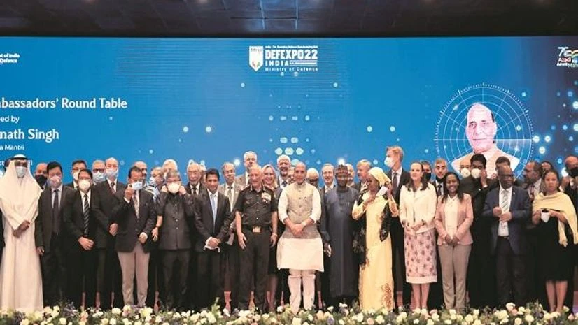Defence Expo Union Defence Minister Rajnath Singh, Chief of Defence Staff General Bipin Rawat, and others pose for a group photograph after the Ambassadors Roundtable on DEFEXPO-22, in New Delhi, on Monday. (Photo: PTI)