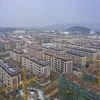 A view of development project somewhere in China. The country’s indebted developers are struggling to meet Beijing’s tighter financing rules. (Bloomberg photo)
