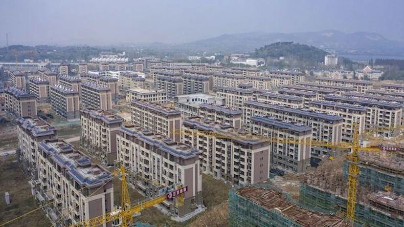 A view of development project somewhere in China. The country's indebted developers are struggling to meet Beijing's tighter financing rules. (Bloomberg photo) A view of development project somewhere in China. The country’s indebted developers are struggling to meet Beijing’s tighter financing rules. (Bloomberg photo)