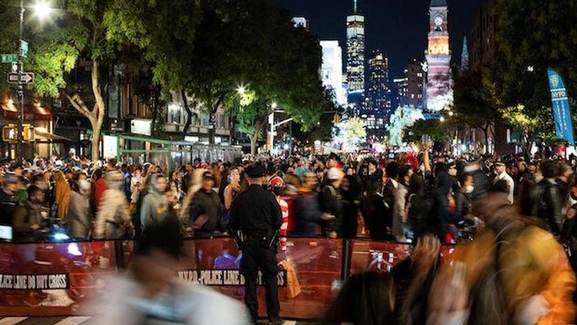 A New York Police Officer keeps an eye on revellers while they take part in the NYC Halloween Parade as the event returns to the streets of Lower Manhattan for the first time since the coronavirus disease outbreak in New York City (Photo: Reuters) A New York Police Officer keeps an eye on revellers while they take part in the NYC Halloween Parade as the event returns to the streets of Lower Manhattan for the first time since the coronavirus disease outbreak in New York City (Photo: Reuters)