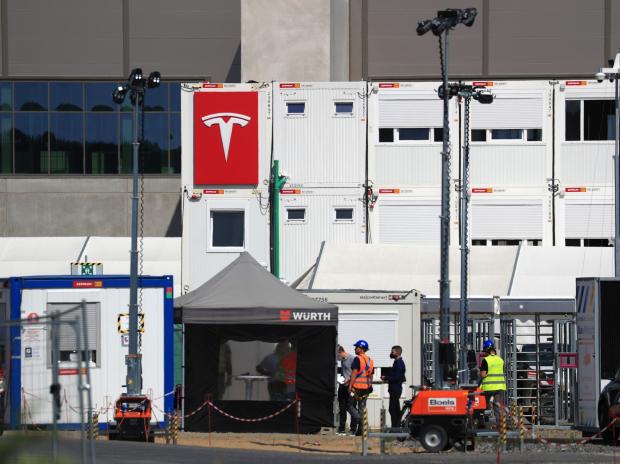 Volkswagen CEO tells German workers Tesla factory will threaten jobs