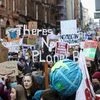 Demonstrators carry placards at a Fridays for Future march during the UN Climate Change Conference (COP26), in Glasgow (Photo: Reuters)