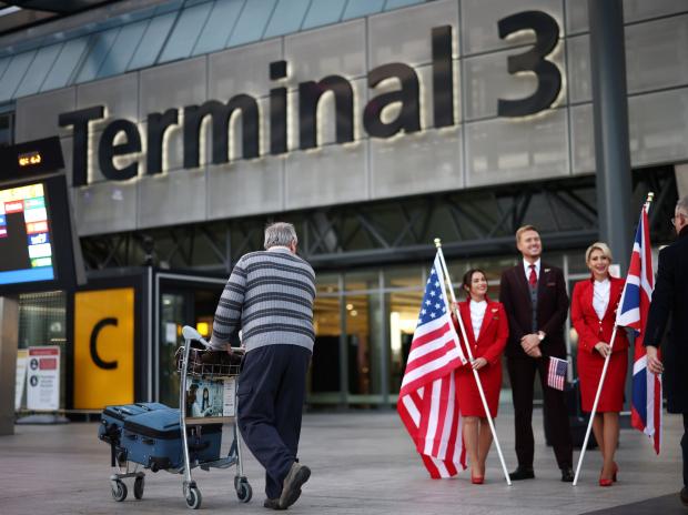 Eager travellers line up for US flights as Covid travel curbs are lifted